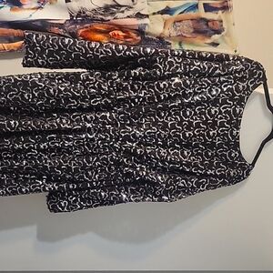 Black sequined dress size 18 worn once. Lined nicely not itchy.